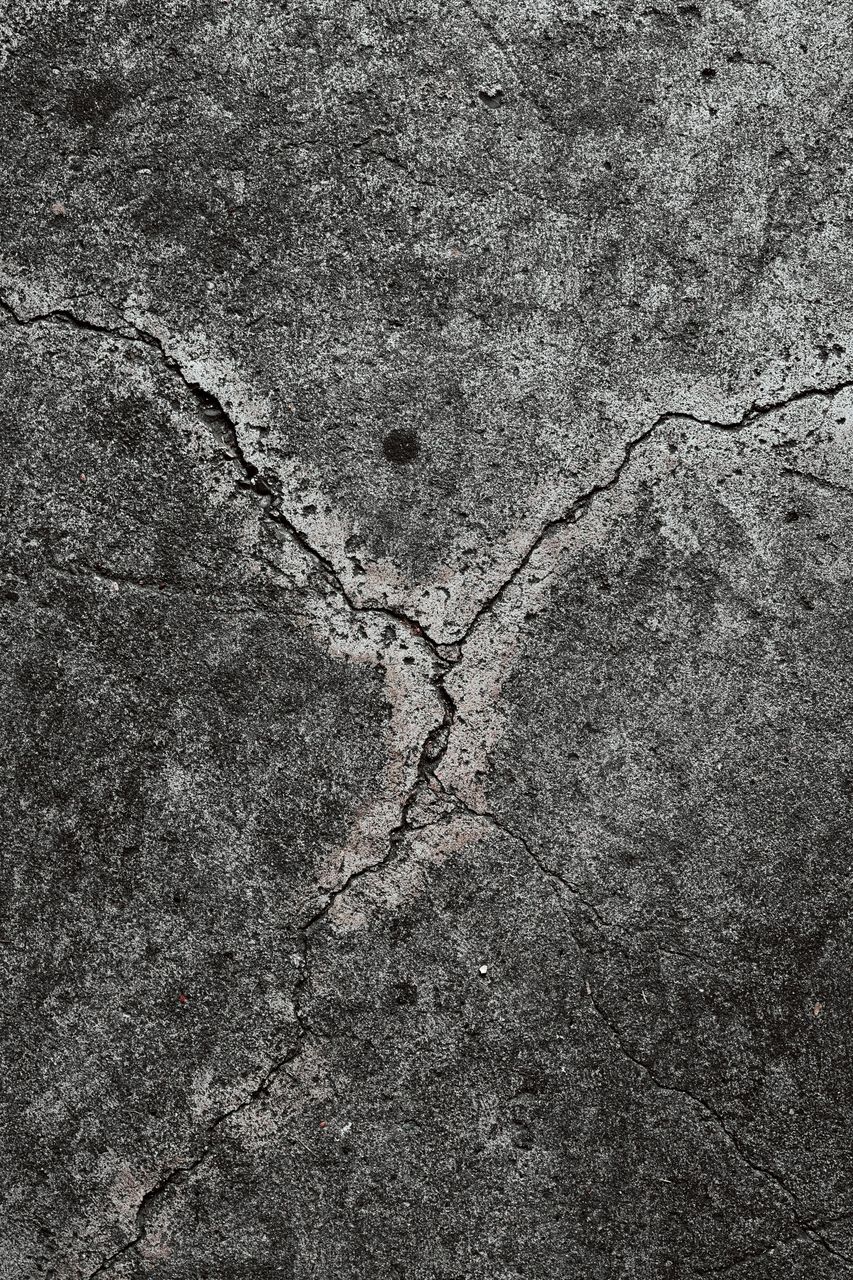 Cracked concrete showing seawall repair warning signs